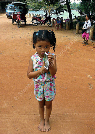 Child selling post cards at Angkor Wat